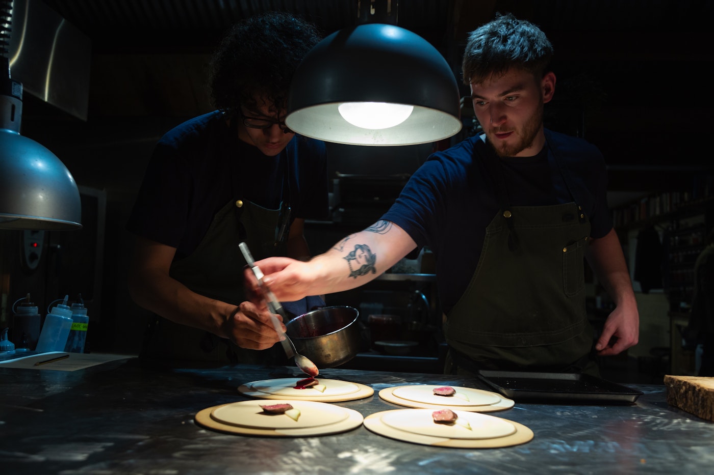 Joel and Archie in Restaurant Jericho's kitchen alt text